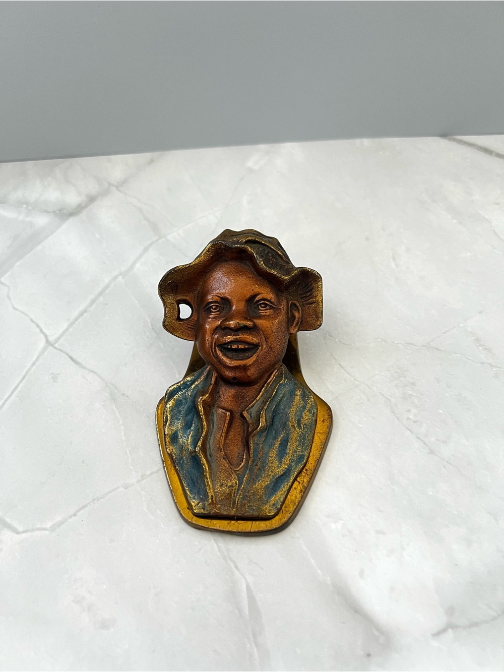Antique Judd Johnny Griffin Boy Cast Iron Letter Clip marked 5247
